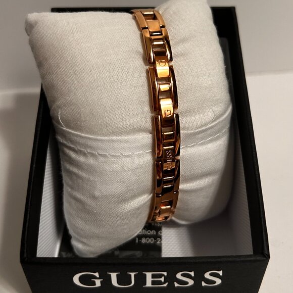 Guess Rose Gold-Tone Cutout Bracelet Analog Watch - Picture 7 of 13